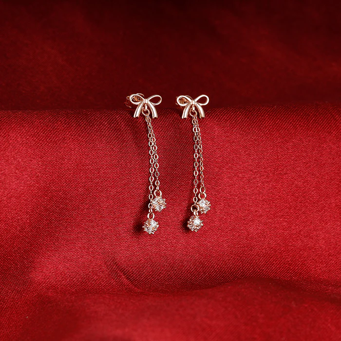 Rose Gold Bow Dangler Earrings - Image 4